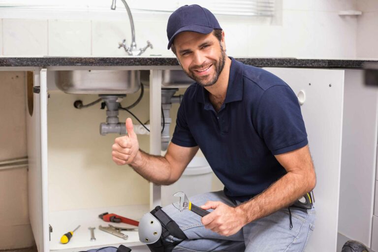 plumber-fixing-sink
